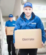 Anyvan movers moving boxes as part of a home removal